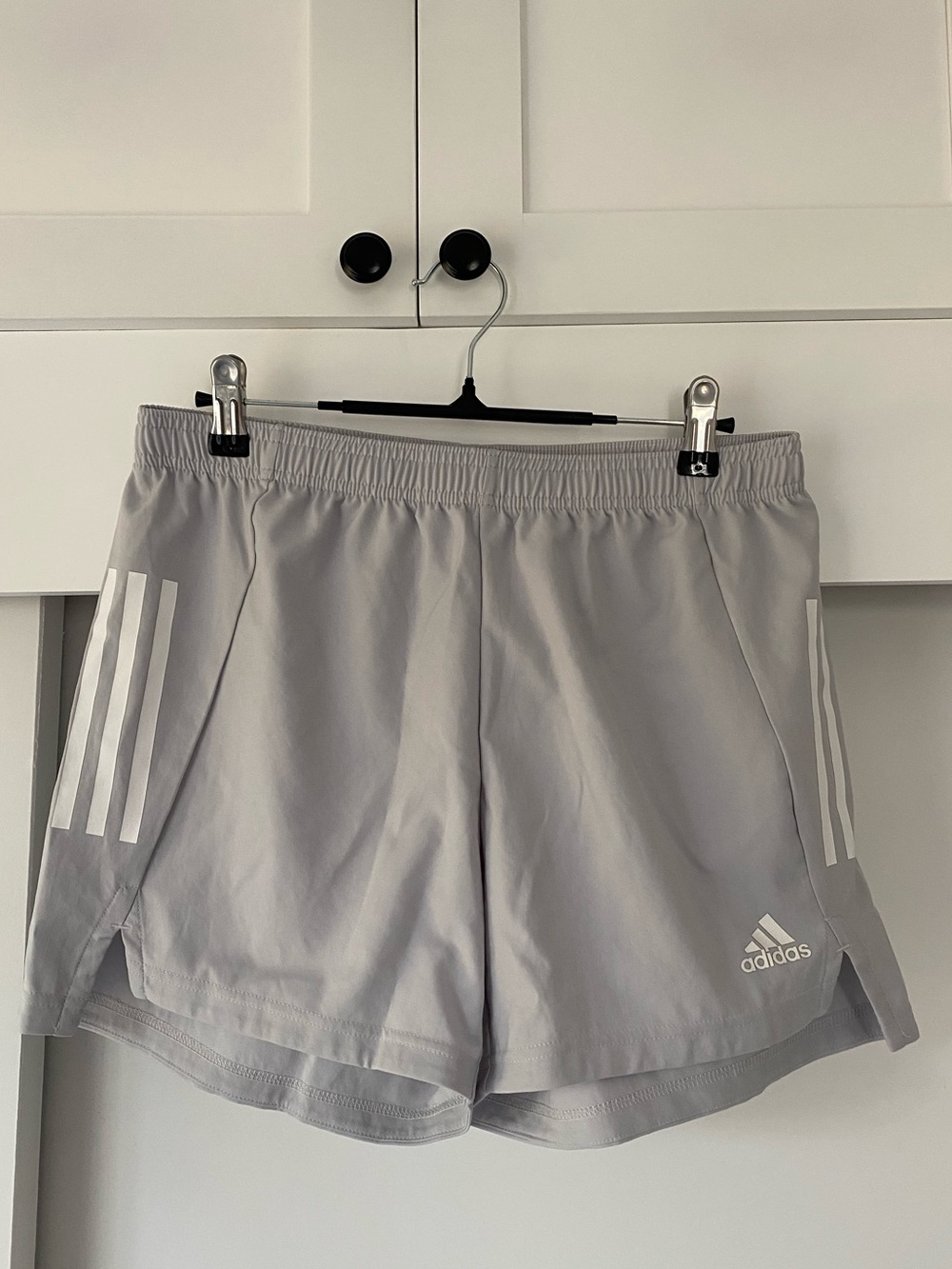 adidas Women’s Light Gray Athletic Shorts with White Stripes